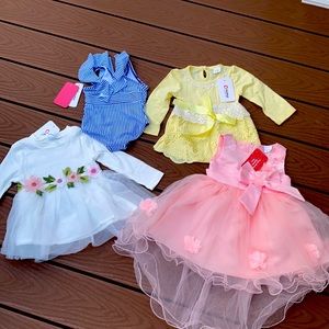 4 piece baby girl set. 3 dresses 1 bathing suit. 3-6 months